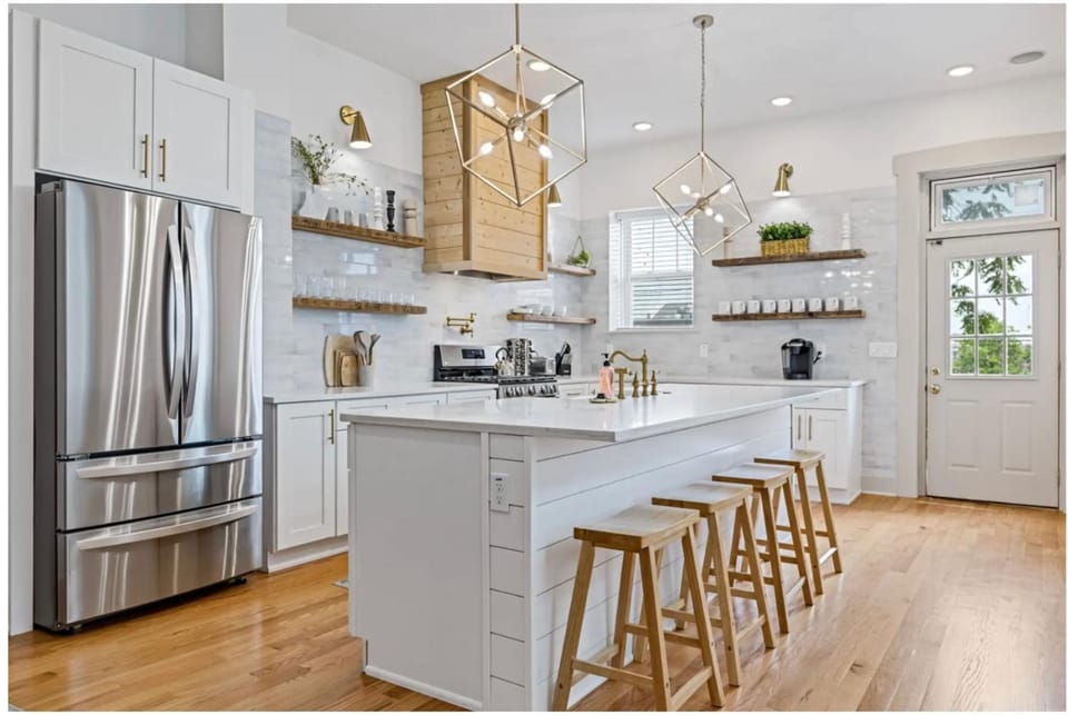 Kitchen or kitchenette, dishwasher, oven, stove, toaster