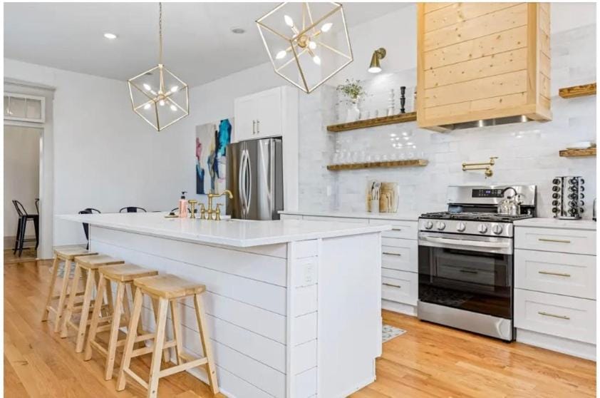 Kitchen or kitchenette, dishwasher, oven, stove, toaster