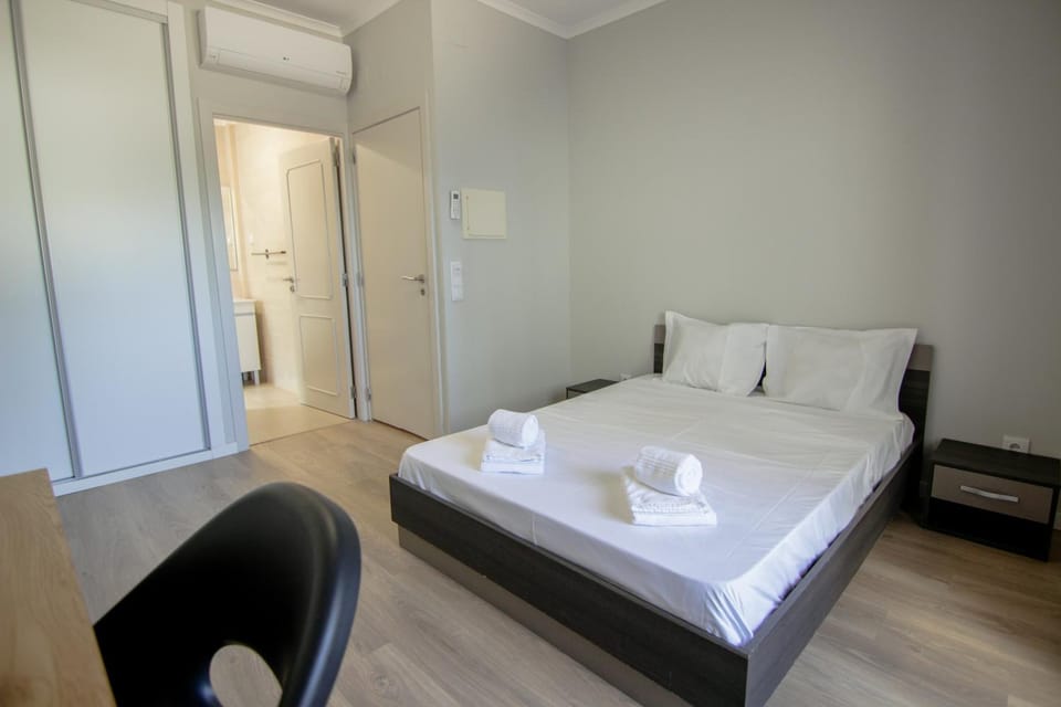 Bed, Seating area, Bedroom, wardrobe, air conditioner
