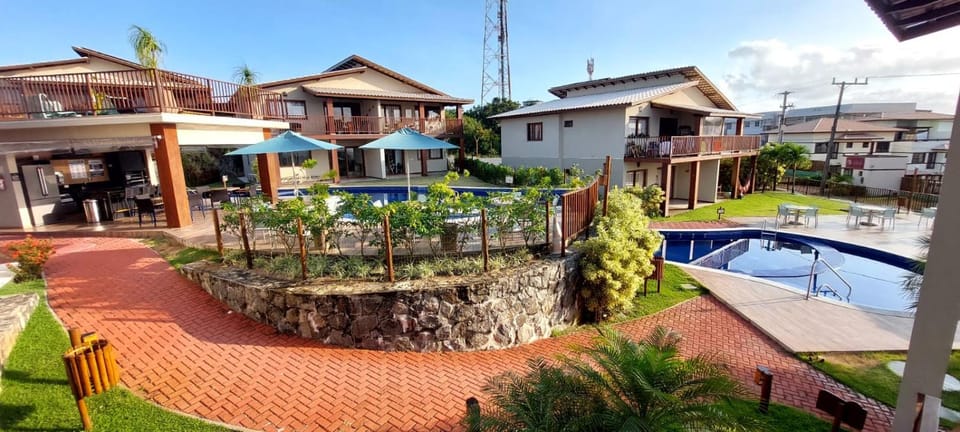 Property building, Patio, Day, Neighbourhood, Pool view, Swimming pool, Location, sunbed