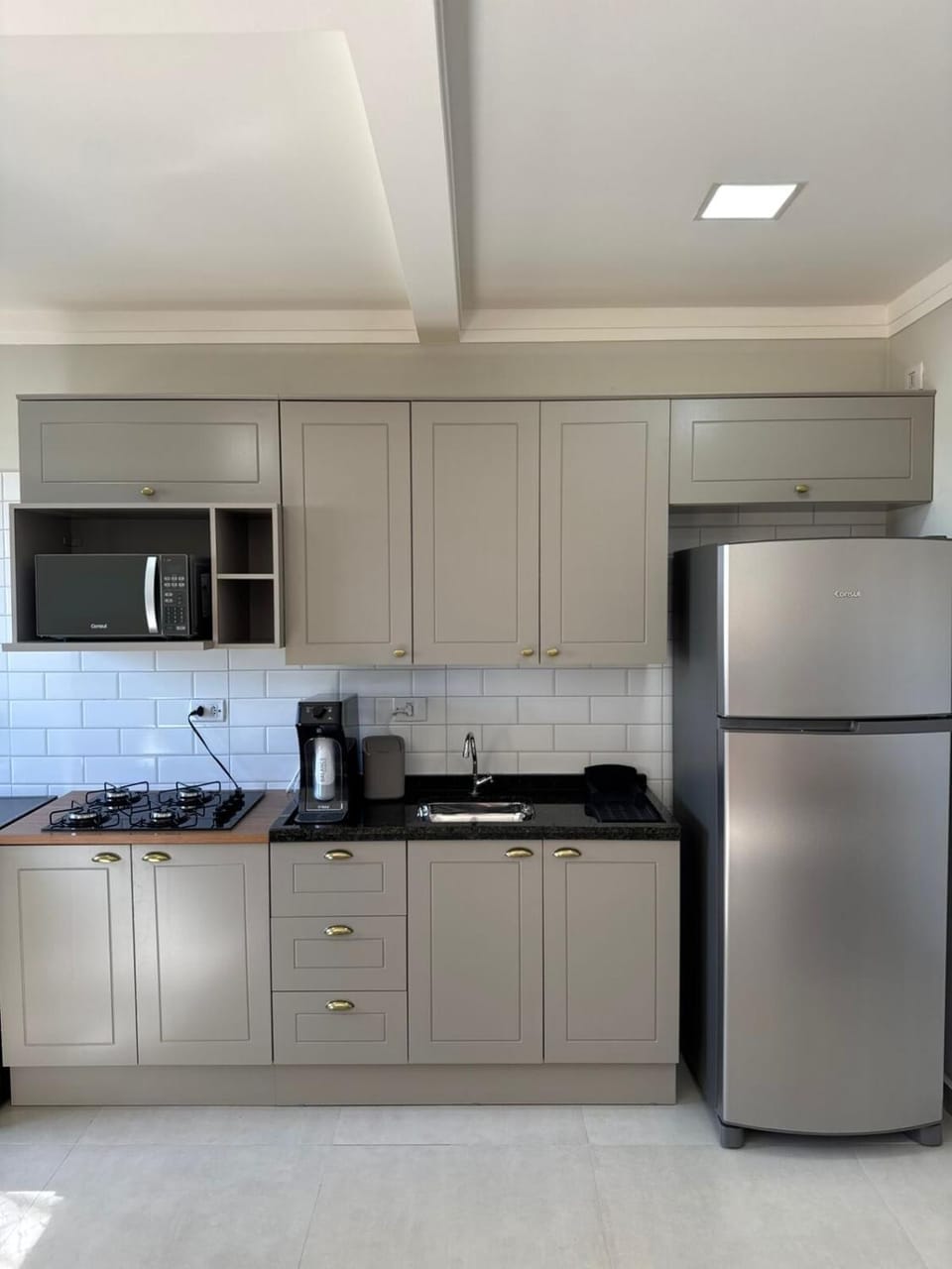 Kitchen or kitchenette, stove, toaster