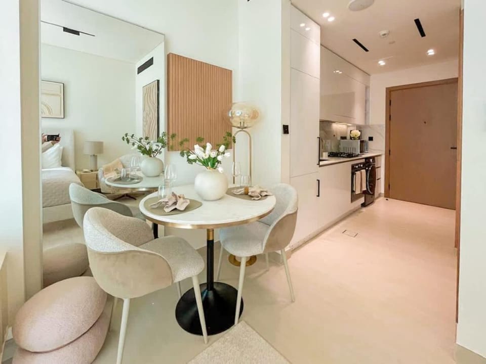 Warm-Toned Studio with City Views in Binghatti Azure Apartment in Dubai