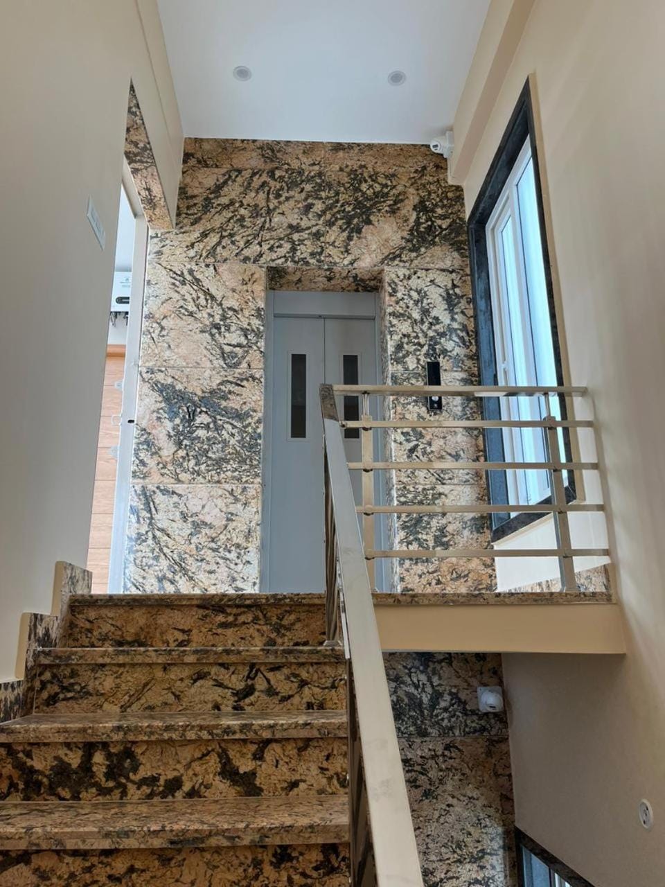 Property building, elevator