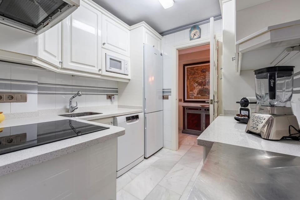 Kitchen or kitchenette, dishwasher, oven, stove, toaster