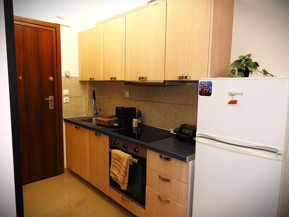 Kitchen or kitchenette, stove