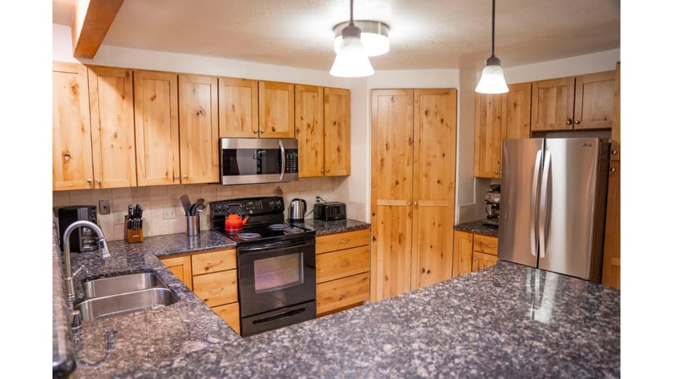 Kitchen or kitchenette, microwave, oven, stove, toaster, kitchen