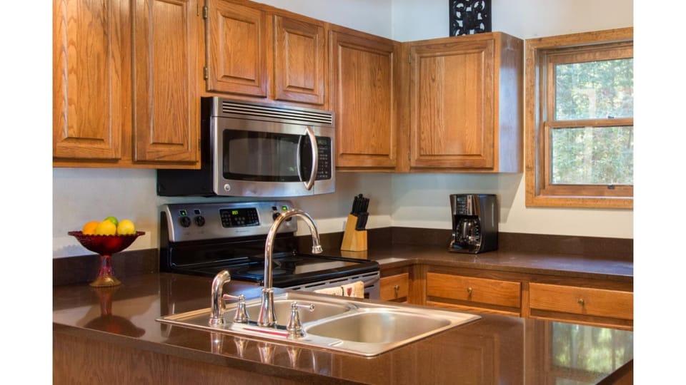 Kitchen or kitchenette, microwave, oven, stove, kitchen
