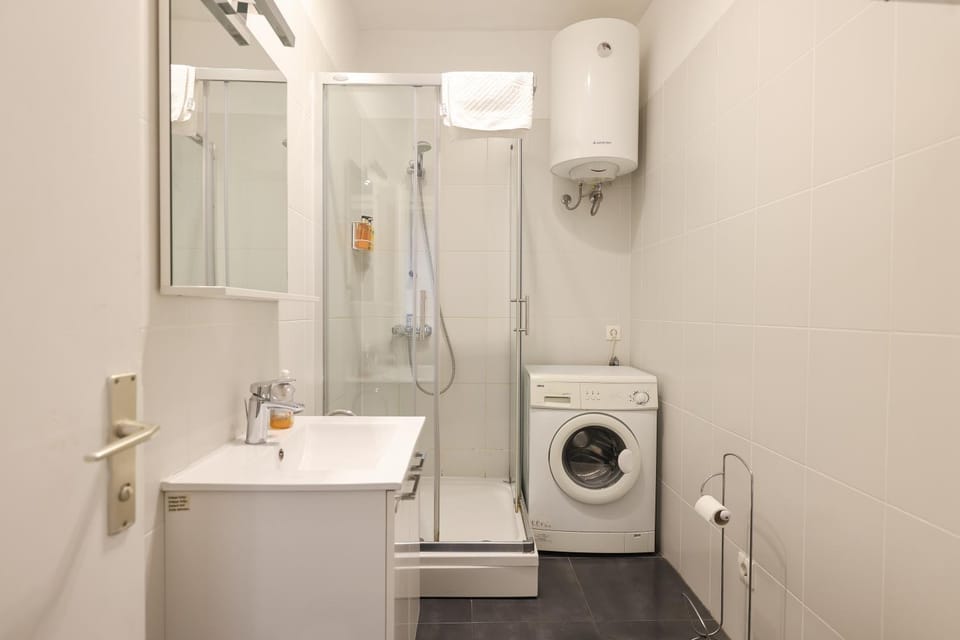 Shower, Toilet, Bathroom, towels, washing machine, dryer