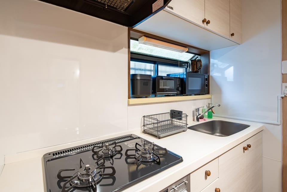 Kitchen or kitchenette, stove