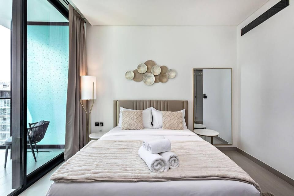 Stylish 1BR Studio Unit Balcony & Pool Apartment in Dubai