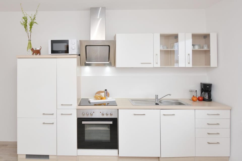 Kitchen or kitchenette, stove, kitchen