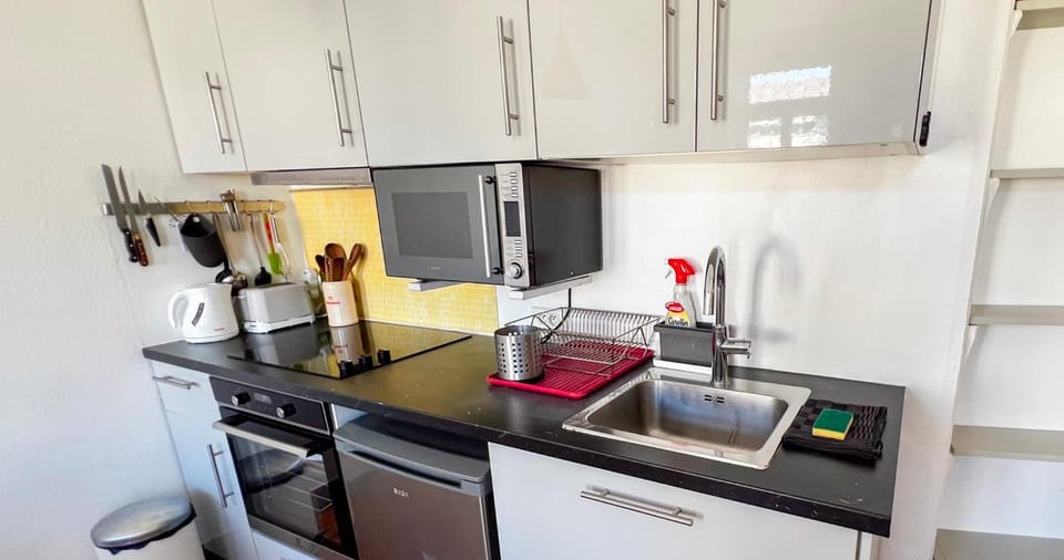 Kitchen or kitchenette, oven, stove, toaster