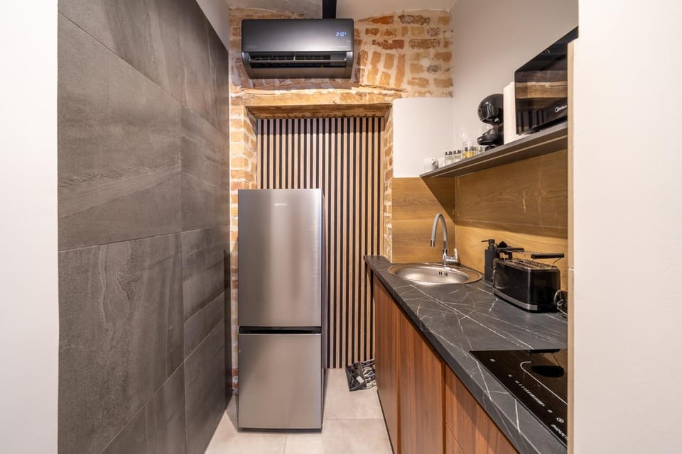 Kitchen or kitchenette, stove