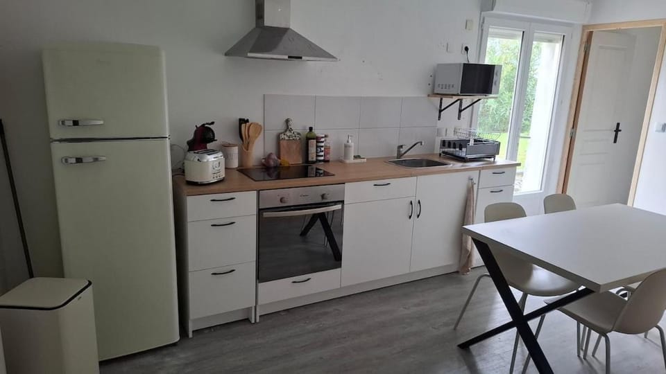 Kitchen or kitchenette, oven, stove