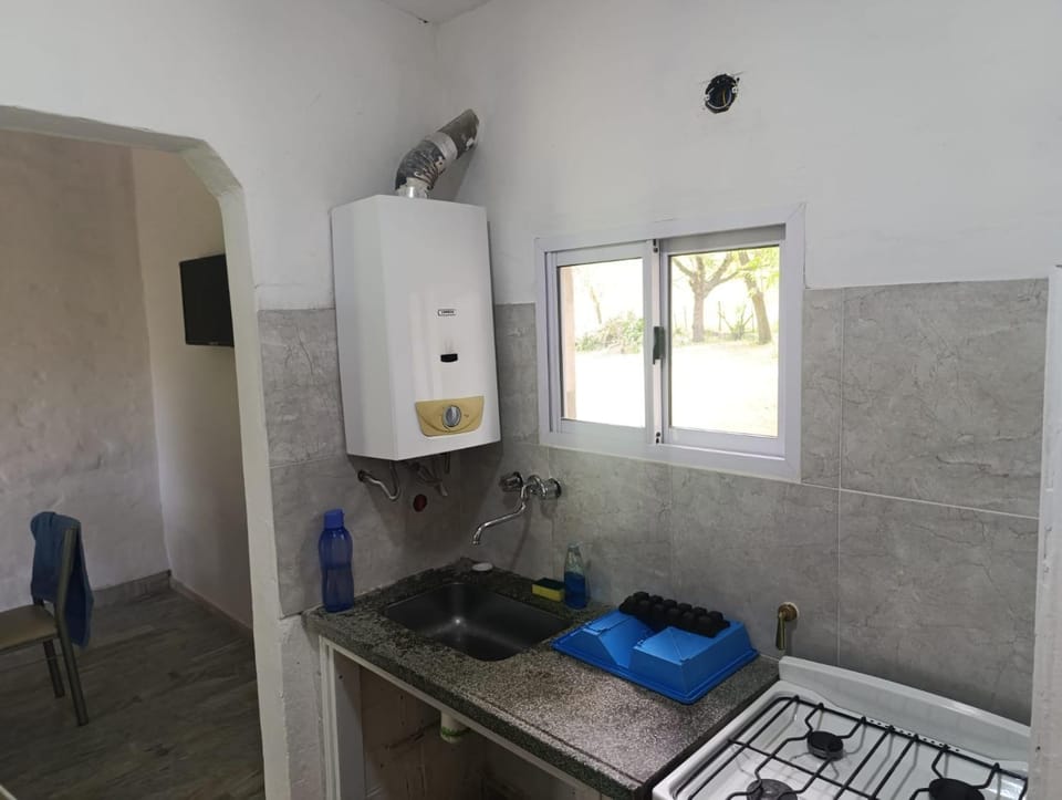 Kitchen or kitchenette, oven, stove
