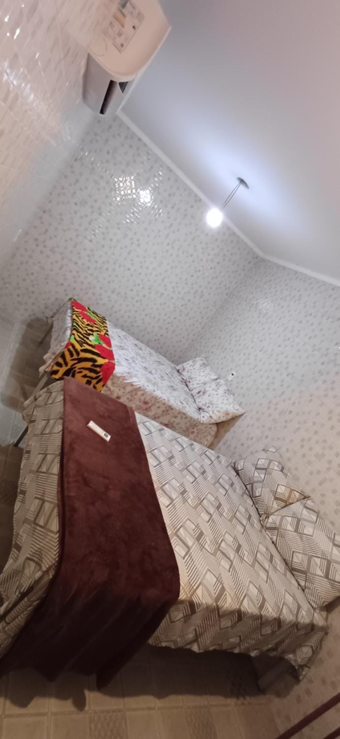Photo of the whole room, air conditioner