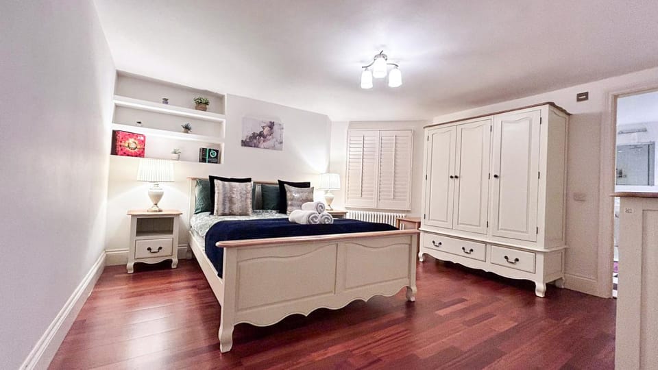 Bed, Photo of the whole room, Decorative detail, Bedroom, flat iron, hair dryier, heating, internet, storage, towels, wardrobe