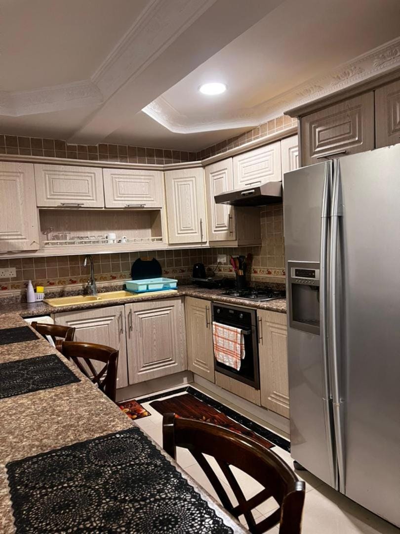 Kitchen or kitchenette, oven, stove