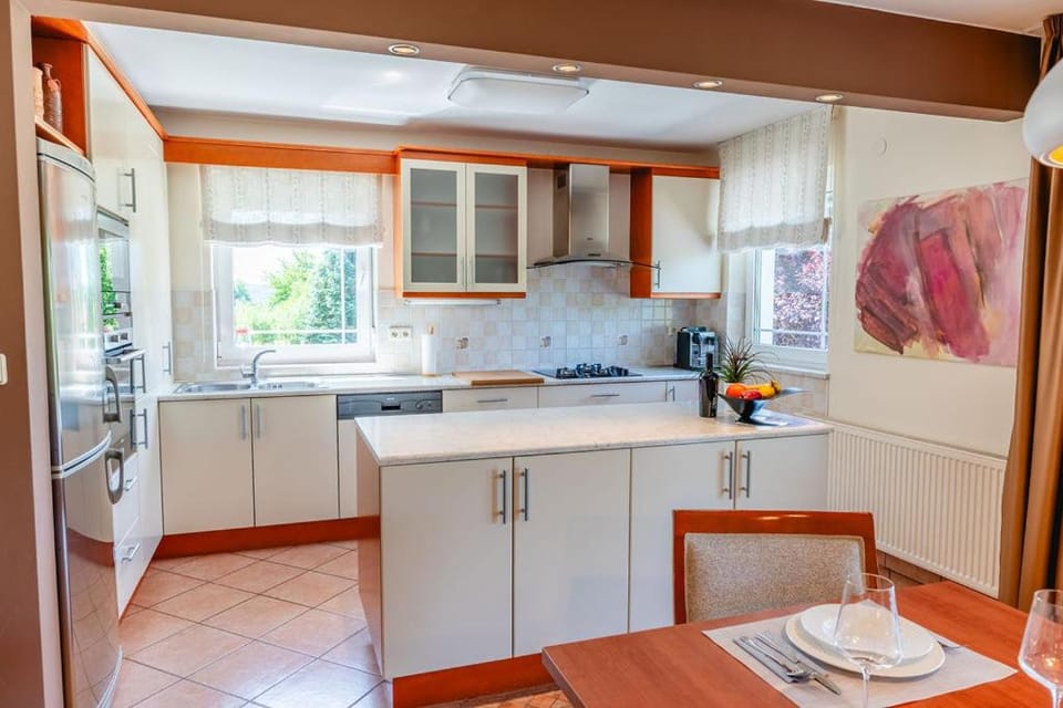Dining area, dishwasher, oven, stove, kitchen