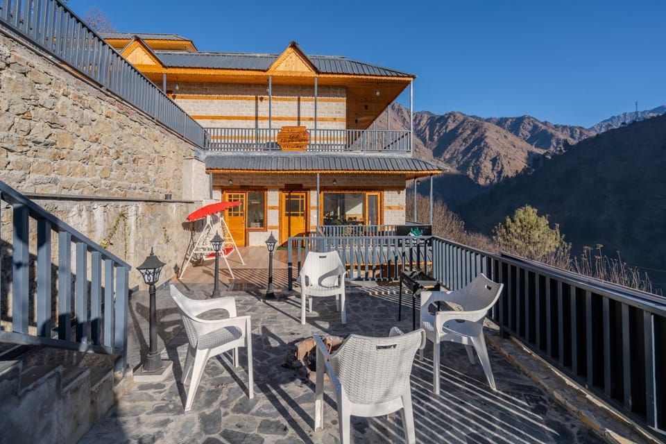 Property building, Patio, Facade/entrance, View (from property/room), Seating area, Mountain view