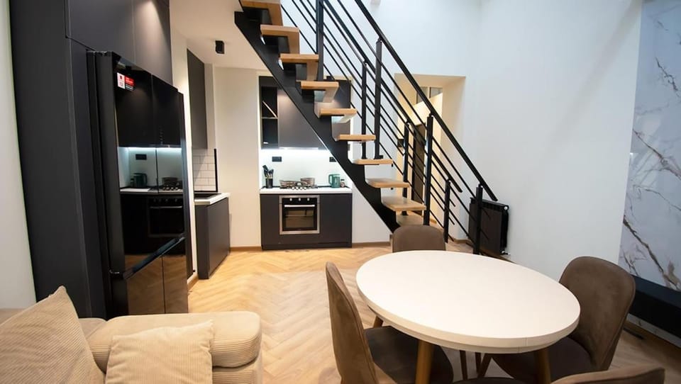 Kitchen or kitchenette, Living room, Seating area, Dining area
