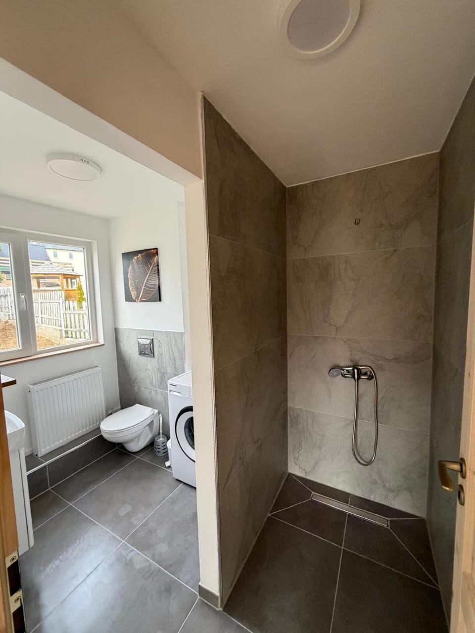 Shower, Toilet, Bathroom, bidet, towels, washing machine