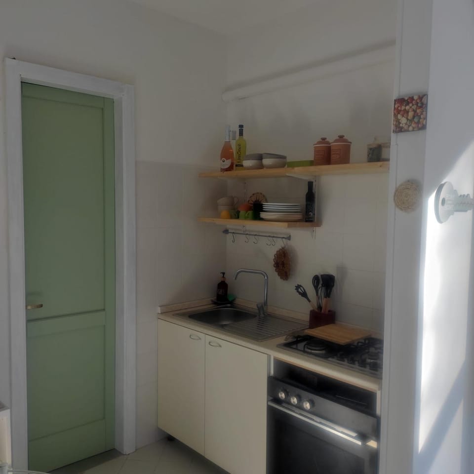 Kitchen or kitchenette, stove