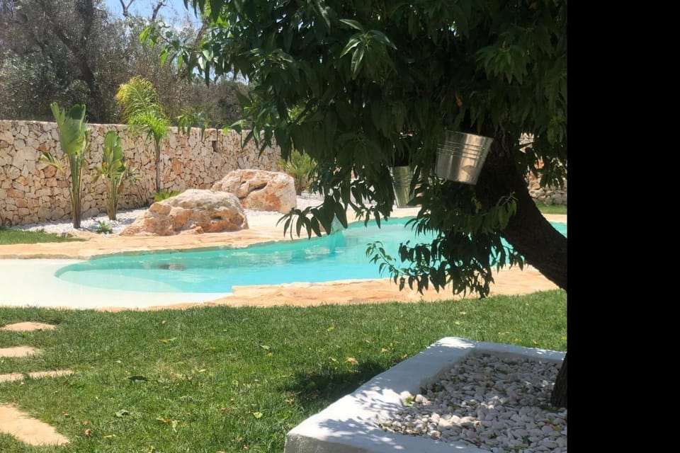 Property building, Living room, Swimming pool