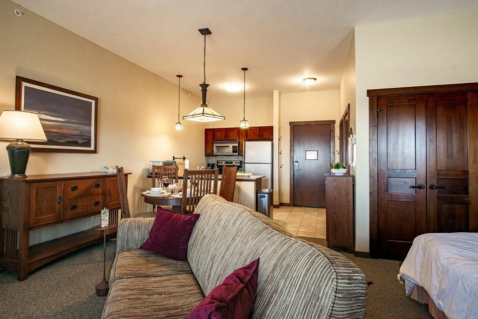 Bed, Living room, Seating area, Dining area