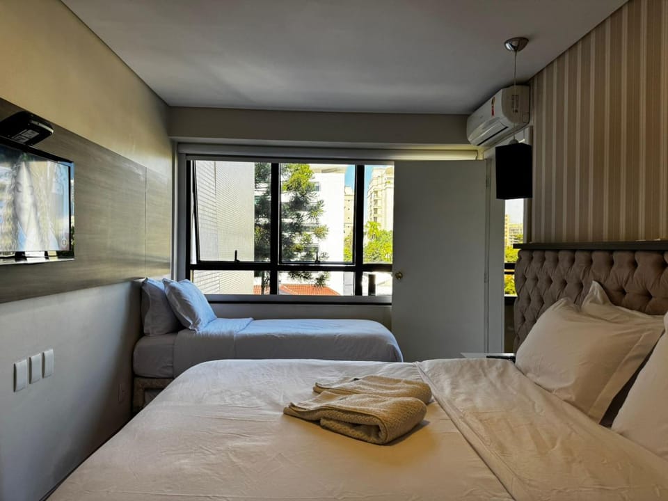 Bed, Photo of the whole room, Bedroom, towels, air conditioner