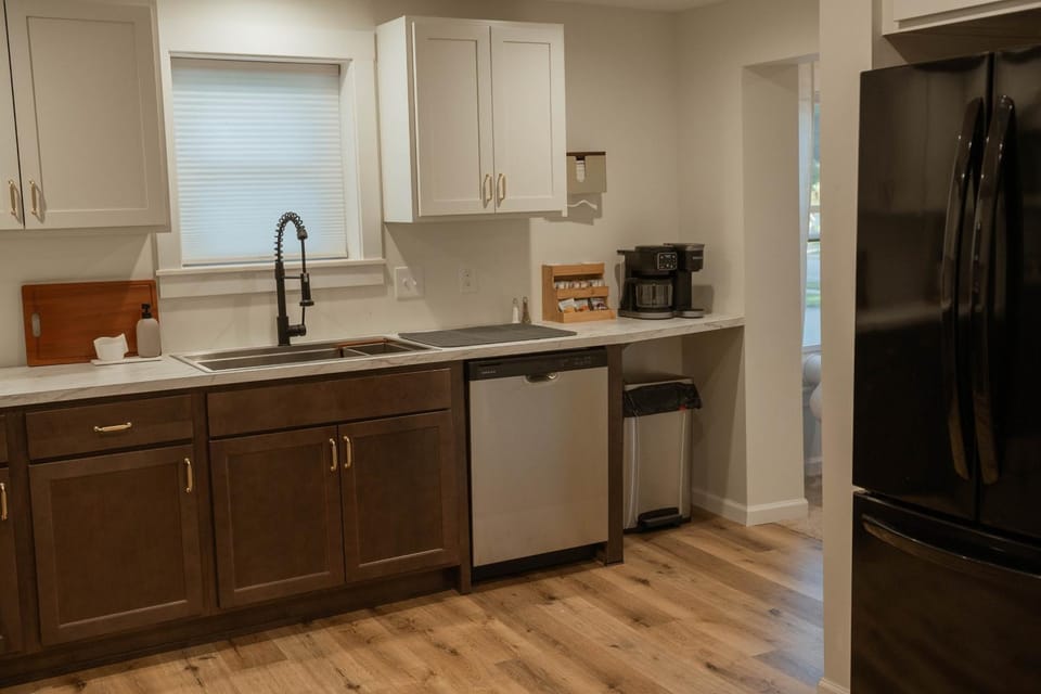 Kitchen or kitchenette, dishwasher, oven, stove