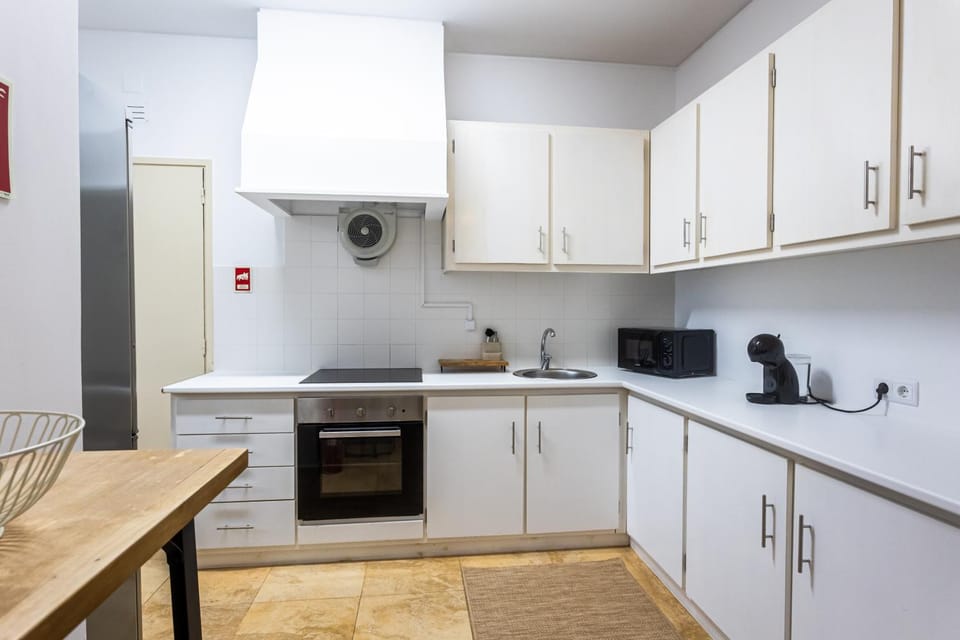 Kitchen or kitchenette, oven, stove