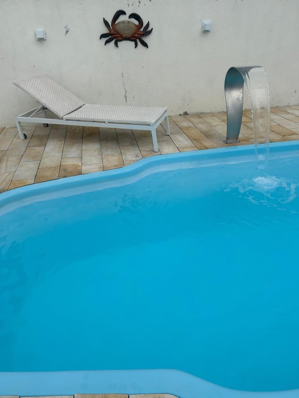 Swimming pool, sunbed