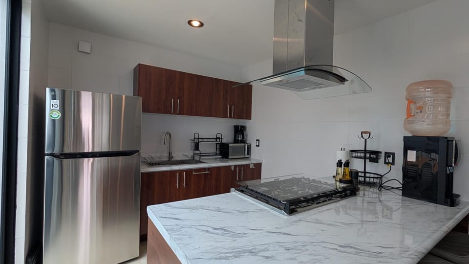 Kitchen or kitchenette, oven, stove, toaster