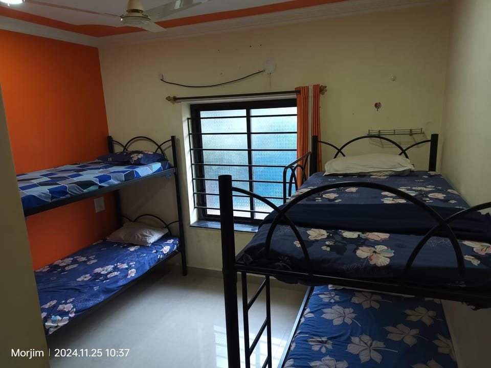 Bunk bed room by the beach Hostel in Goa, India
