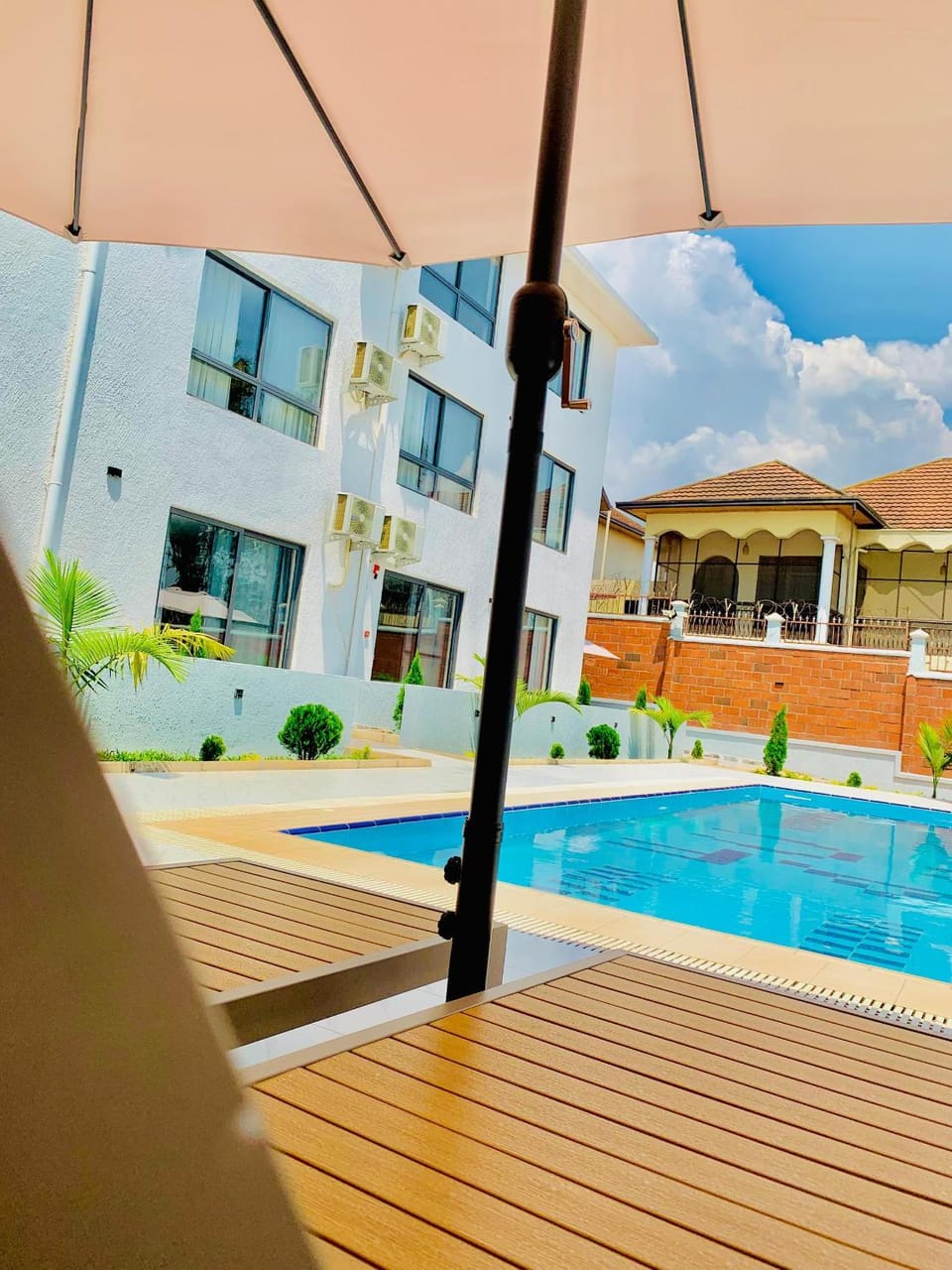 Property building, Day, Pool view, Swimming pool