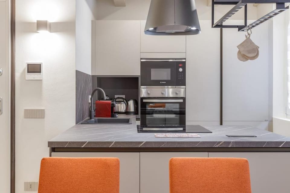 Kitchen or kitchenette, oven, stove