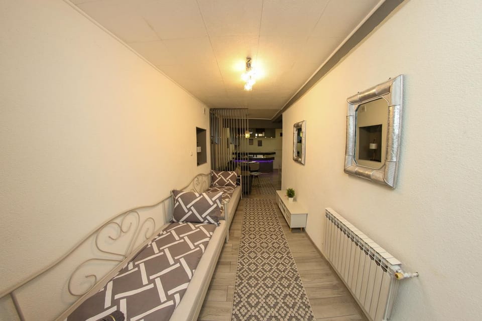 Bed, Living room, Seating area, Bedroom