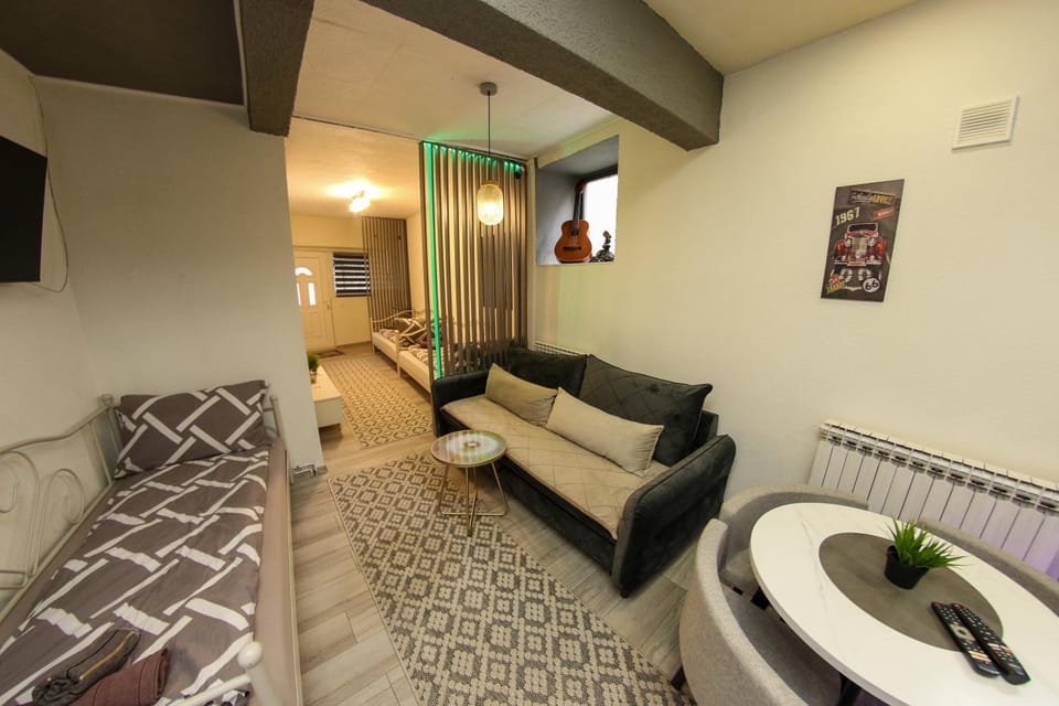 Bed, TV and multimedia, Living room, Seating area