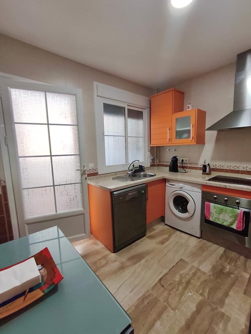 Kitchen or kitchenette, dishwasher, oven, stove, washing machine