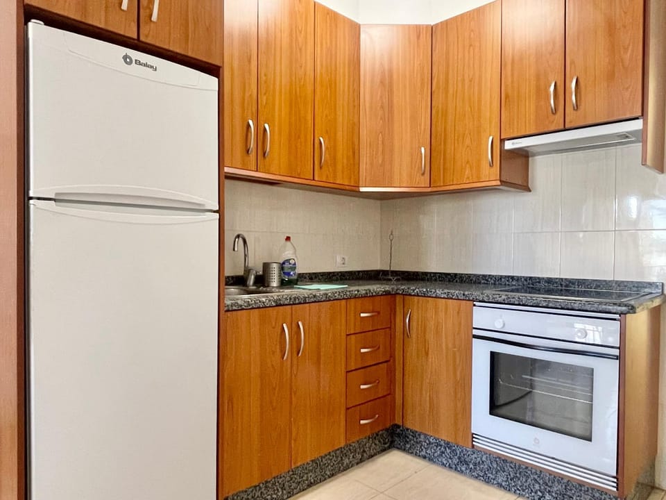 Kitchen or kitchenette, oven, stove