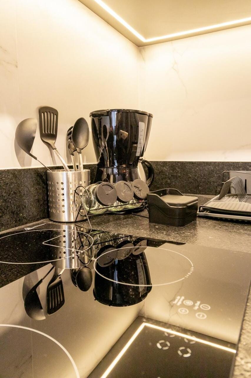 Apartamento novo e completo com garagem, no centro de Curitiba Apartment in Curitiba