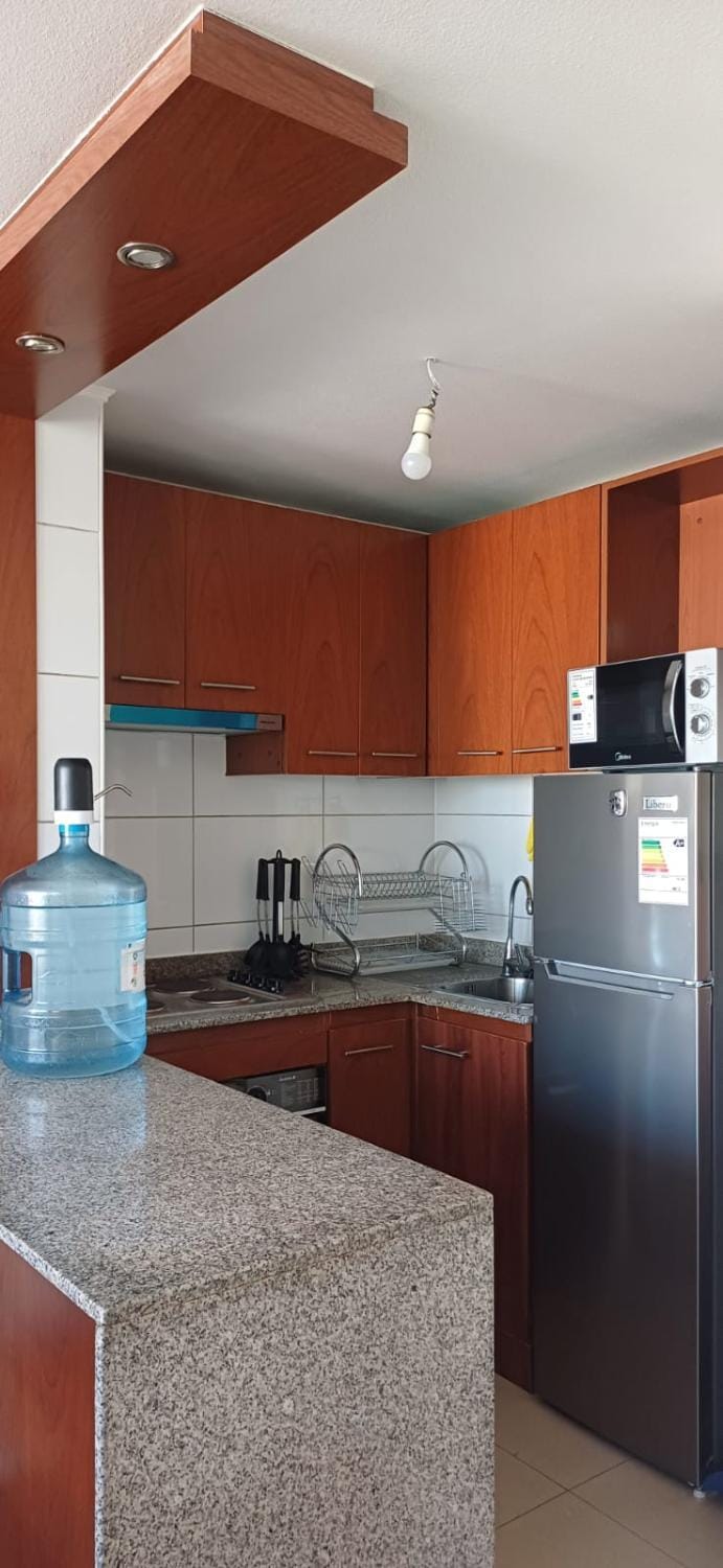 Kitchen or kitchenette, microwave, oven, toaster
