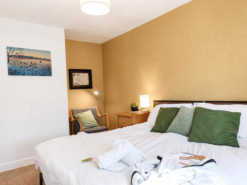 Bed, Photo of the whole room, Decorative detail, Bedroom, River view, towels