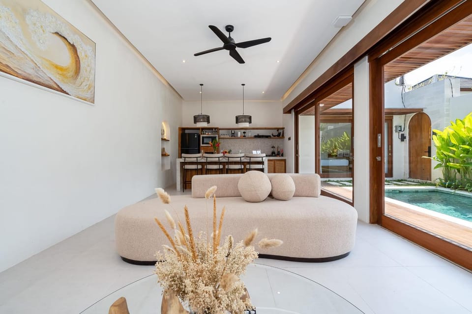 Living room, Seating area, Pool view