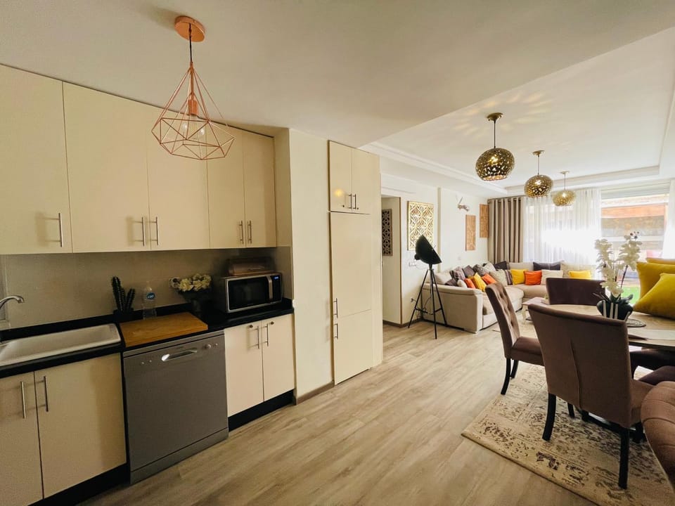 Dining area, dishwasher, oven, stove, toaster