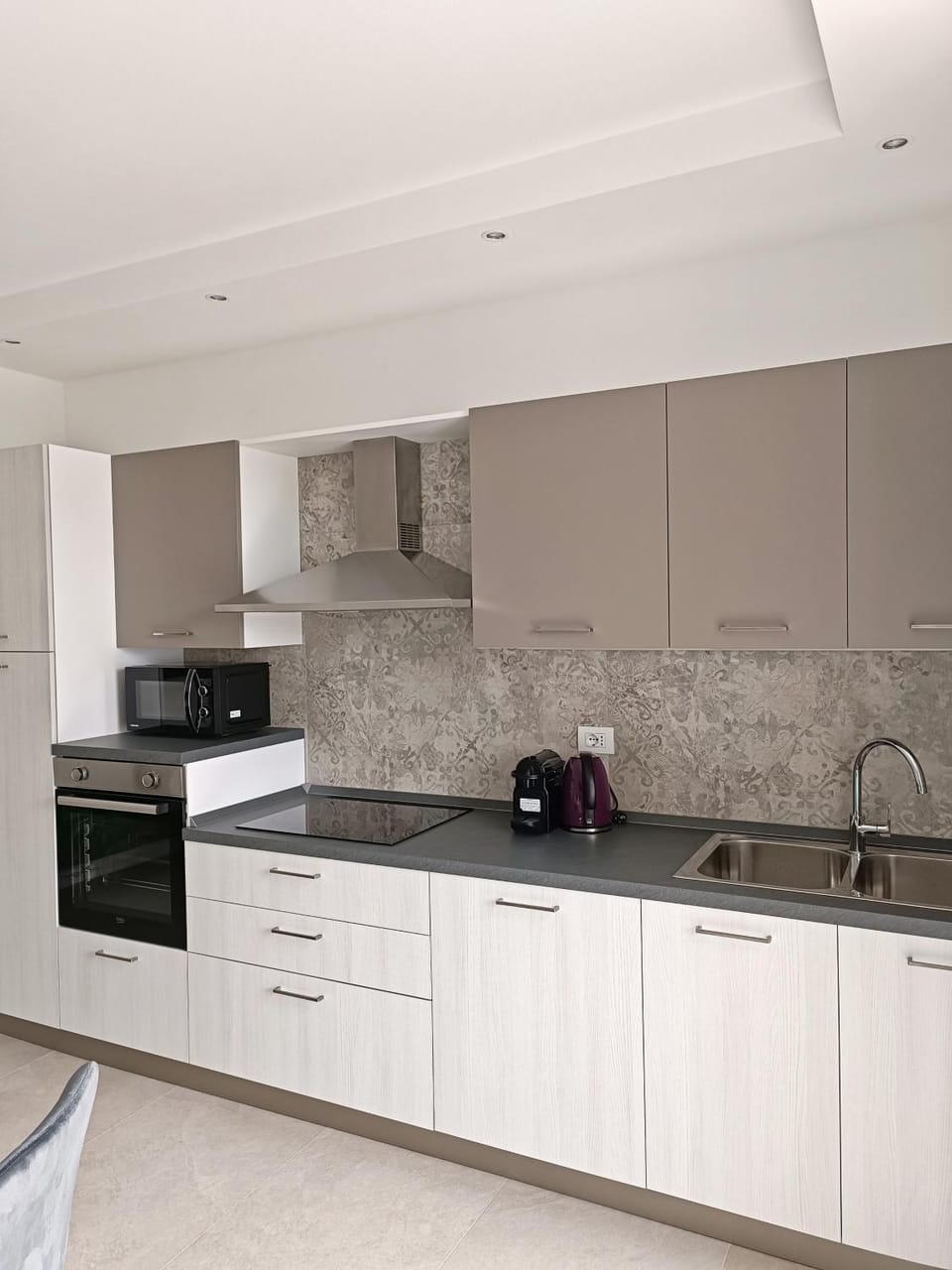 Kitchen or kitchenette, dishwasher, microwave, stove