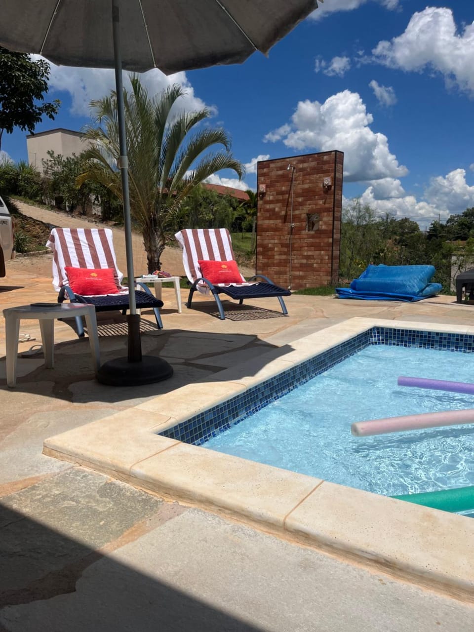 Patio, Day, Natural landscape, Pool view, sunbed