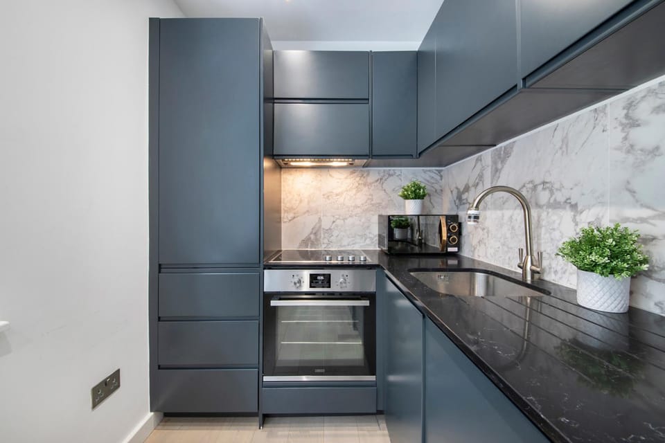 Kitchen or kitchenette, oven, stove, toaster