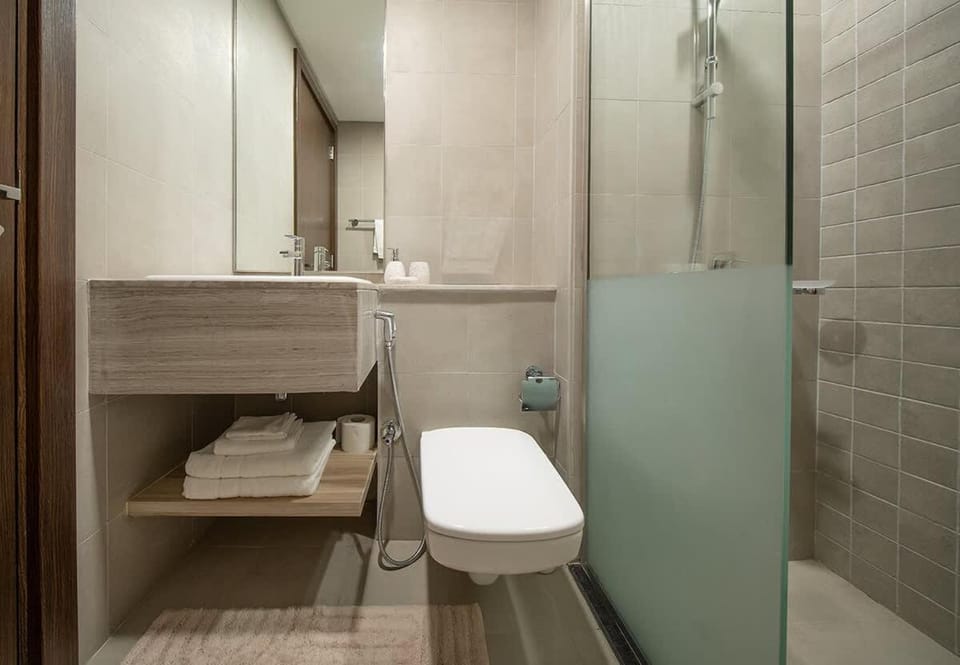 Stunning Oceanfront Studio Stay - Blue Bay Walk Pool & Gym Apartment in Sharjah